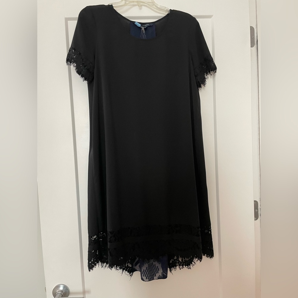 French Connection midi dress. Solid black front with gorgeous lace trim.